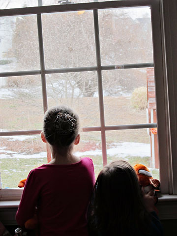 snow-2-girls-watching-from-window.jpg